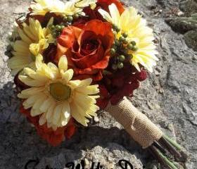 Real Touch Dasies, Rust/Orange Roses, Eva Berries and twisted vines. Great for that Fall Wedding. Satin, Camo or Burlap Ribbon.